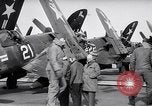 Image of F4U airplanes being moved on USS Badoeng Strait (CVE – 116) Pacific Ocean, 1950, second 30 stock footage video 65675040316