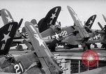 Image of F4U airplanes being moved on USS Badoeng Strait (CVE – 116) Pacific Ocean, 1950, second 35 stock footage video 65675040316