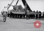 Image of F4U airplanes being moved on USS Badoeng Strait (CVE – 116) Pacific Ocean, 1950, second 39 stock footage video 65675040316