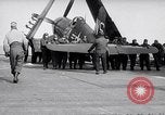 Image of F4U airplanes being moved on USS Badoeng Strait (CVE – 116) Pacific Ocean, 1950, second 40 stock footage video 65675040316