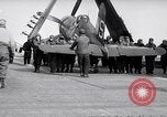 Image of F4U airplanes being moved on USS Badoeng Strait (CVE – 116) Pacific Ocean, 1950, second 42 stock footage video 65675040316