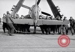 Image of F4U airplanes being moved on USS Badoeng Strait (CVE – 116) Pacific Ocean, 1950, second 45 stock footage video 65675040316