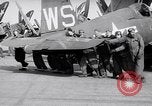 Image of F4U airplanes being moved on USS Badoeng Strait (CVE – 116) Pacific Ocean, 1950, second 48 stock footage video 65675040316