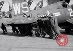 Image of F4U airplanes being moved on USS Badoeng Strait (CVE – 116) Pacific Ocean, 1950, second 49 stock footage video 65675040316