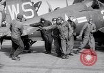 Image of F4U airplanes being moved on USS Badoeng Strait (CVE – 116) Pacific Ocean, 1950, second 55 stock footage video 65675040316