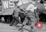 Image of F4U airplanes being moved on USS Badoeng Strait (CVE – 116) Pacific Ocean, 1950, second 56 stock footage video 65675040316