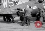 Image of F4U airplanes being moved on USS Badoeng Strait (CVE – 116) Pacific Ocean, 1950, second 57 stock footage video 65675040316