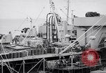 Image of USS Chara supply transfer Pacific Ocean, 1950, second 10 stock footage video 65675040317