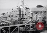 Image of USS Chara supply transfer Pacific Ocean, 1950, second 17 stock footage video 65675040317