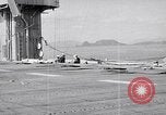 Image of flight deck crew Pacific Ocean, 1950, second 51 stock footage video 65675040318