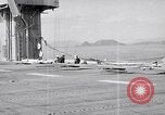 Image of flight deck crew Pacific Ocean, 1950, second 54 stock footage video 65675040318