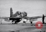 Image of Aircraft F4Us catapulted from USS Badoeng Strait Pacific Ocean, 1950, second 1 stock footage video 65675040319