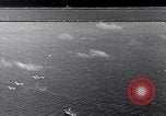 Image of TBF Avenger aircraft landing on USS Marcus Island CVE-77 Pacific Ocean, 1944, second 1 stock footage video 65675040321