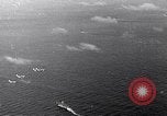 Image of TBF Avenger aircraft landing on USS Marcus Island CVE-77 Pacific Ocean, 1944, second 3 stock footage video 65675040321