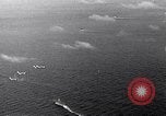 Image of TBF Avenger aircraft landing on USS Marcus Island CVE-77 Pacific Ocean, 1944, second 4 stock footage video 65675040321