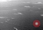 Image of TBF Avenger aircraft landing on USS Marcus Island CVE-77 Pacific Ocean, 1944, second 8 stock footage video 65675040321