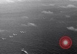 Image of TBF Avenger aircraft landing on USS Marcus Island CVE-77 Pacific Ocean, 1944, second 10 stock footage video 65675040321