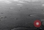 Image of TBF Avenger aircraft landing on USS Marcus Island CVE-77 Pacific Ocean, 1944, second 13 stock footage video 65675040321