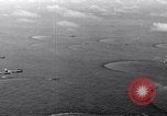 Image of TBF Avenger aircraft landing on USS Marcus Island CVE-77 Pacific Ocean, 1944, second 14 stock footage video 65675040321