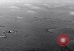 Image of TBF Avenger aircraft landing on USS Marcus Island CVE-77 Pacific Ocean, 1944, second 16 stock footage video 65675040321