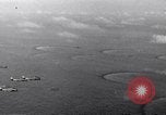 Image of TBF Avenger aircraft landing on USS Marcus Island CVE-77 Pacific Ocean, 1944, second 17 stock footage video 65675040321