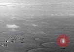 Image of TBF Avenger aircraft landing on USS Marcus Island CVE-77 Pacific Ocean, 1944, second 19 stock footage video 65675040321