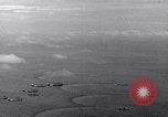 Image of TBF Avenger aircraft landing on USS Marcus Island CVE-77 Pacific Ocean, 1944, second 25 stock footage video 65675040321