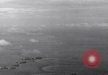 Image of TBF Avenger aircraft landing on USS Marcus Island CVE-77 Pacific Ocean, 1944, second 27 stock footage video 65675040321