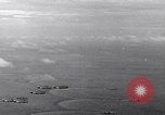Image of TBF Avenger aircraft landing on USS Marcus Island CVE-77 Pacific Ocean, 1944, second 29 stock footage video 65675040321
