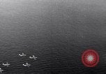 Image of TBF Avenger aircraft landing on USS Marcus Island CVE-77 Pacific Ocean, 1944, second 33 stock footage video 65675040321