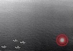 Image of TBF Avenger aircraft landing on USS Marcus Island CVE-77 Pacific Ocean, 1944, second 35 stock footage video 65675040321