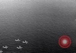 Image of TBF Avenger aircraft landing on USS Marcus Island CVE-77 Pacific Ocean, 1944, second 38 stock footage video 65675040321