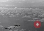 Image of TBF Avenger aircraft landing on USS Marcus Island CVE-77 Pacific Ocean, 1944, second 58 stock footage video 65675040321