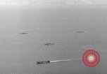 Image of Ships and planes of invasion task force practice maneuvers Pacific Ocean, 1944, second 1 stock footage video 65675040322