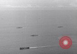 Image of Ships and planes of invasion task force practice maneuvers Pacific Ocean, 1944, second 5 stock footage video 65675040322