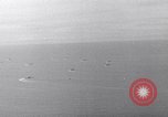 Image of Ships and planes of invasion task force practice maneuvers Pacific Ocean, 1944, second 6 stock footage video 65675040322