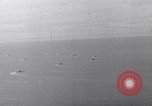 Image of Ships and planes of invasion task force practice maneuvers Pacific Ocean, 1944, second 12 stock footage video 65675040322