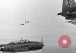Image of Ships and planes of invasion task force practice maneuvers Pacific Ocean, 1944, second 14 stock footage video 65675040322