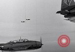 Image of Ships and planes of invasion task force practice maneuvers Pacific Ocean, 1944, second 15 stock footage video 65675040322