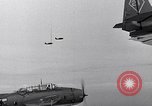 Image of Ships and planes of invasion task force practice maneuvers Pacific Ocean, 1944, second 16 stock footage video 65675040322