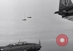 Image of Ships and planes of invasion task force practice maneuvers Pacific Ocean, 1944, second 17 stock footage video 65675040322