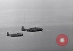 Image of Ships and planes of invasion task force practice maneuvers Pacific Ocean, 1944, second 21 stock footage video 65675040322