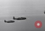 Image of Ships and planes of invasion task force practice maneuvers Pacific Ocean, 1944, second 22 stock footage video 65675040322