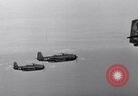 Image of Ships and planes of invasion task force practice maneuvers Pacific Ocean, 1944, second 24 stock footage video 65675040322