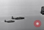 Image of Ships and planes of invasion task force practice maneuvers Pacific Ocean, 1944, second 25 stock footage video 65675040322