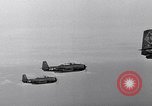 Image of Ships and planes of invasion task force practice maneuvers Pacific Ocean, 1944, second 28 stock footage video 65675040322