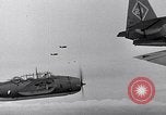 Image of Ships and planes of invasion task force practice maneuvers Pacific Ocean, 1944, second 31 stock footage video 65675040322