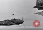 Image of Ships and planes of invasion task force practice maneuvers Pacific Ocean, 1944, second 35 stock footage video 65675040322