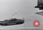 Image of Ships and planes of invasion task force practice maneuvers Pacific Ocean, 1944, second 36 stock footage video 65675040322
