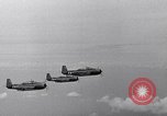 Image of Ships and planes of invasion task force practice maneuvers Pacific Ocean, 1944, second 37 stock footage video 65675040322